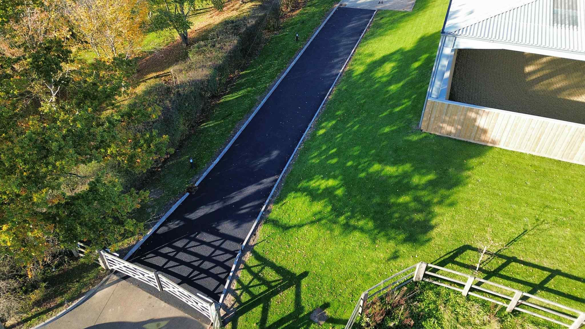 Tarmac driveway and landscaped grounds